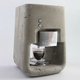 Illustration for article titled Concrete Espresso Machine Would Probably Be Difficult to Break